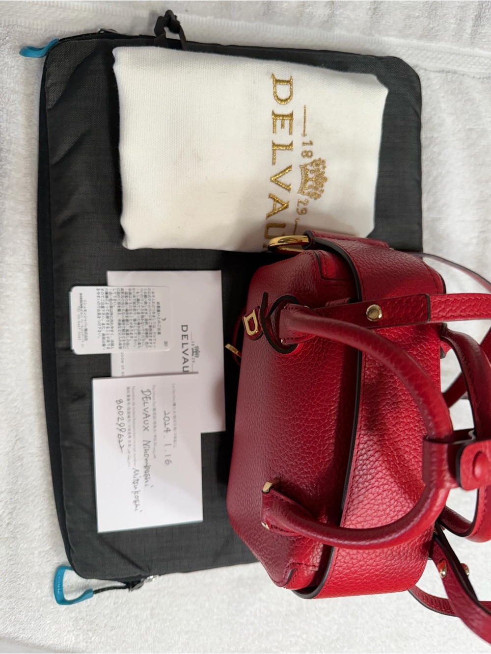 Delvaux Mini Cool Box in Red Pebbled Mini Satchel with Top Handles